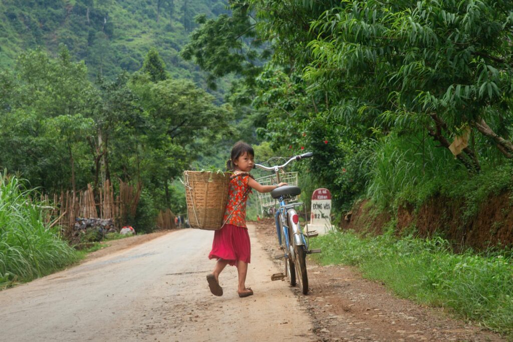 Ha Giang - Little Girl Bicycle Dong Van Village North - NS - fareast247