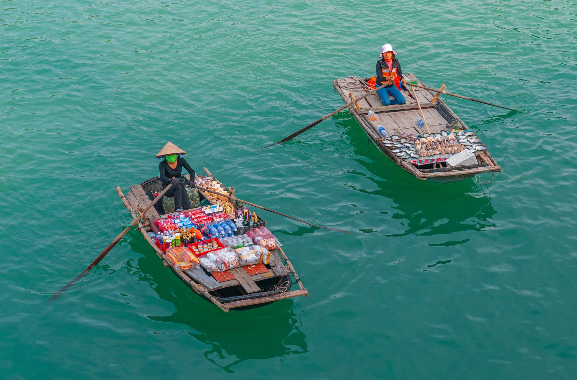 Halong,Bay,,Vietnam,-,November,23,,2009:,Two,Local,Saleswomen - fareast247
